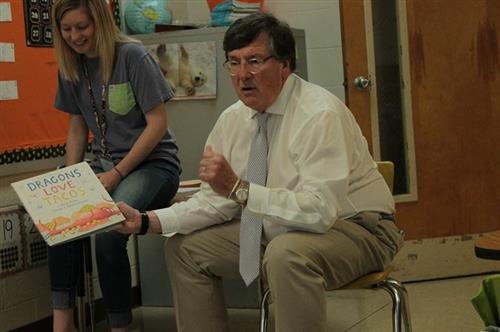 Craig Fitzhugh reads to students. 